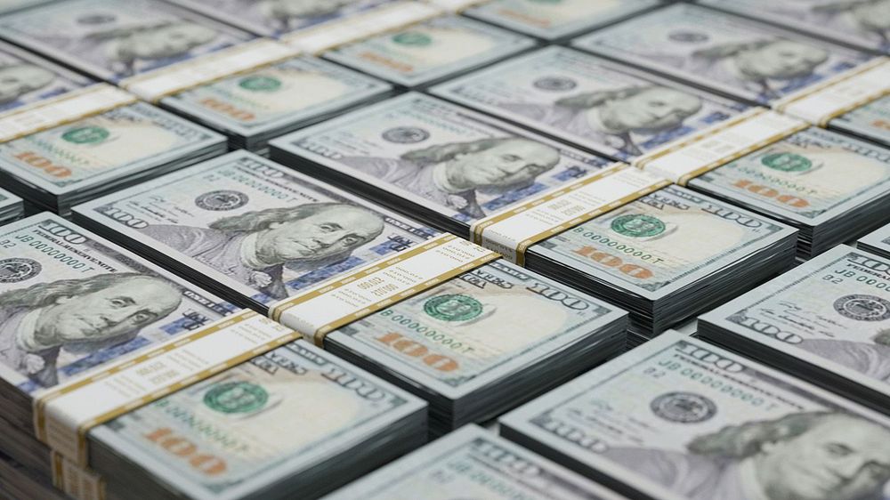 Stacks of hundred-dollar bills, symbolizing finance, wealth, acc