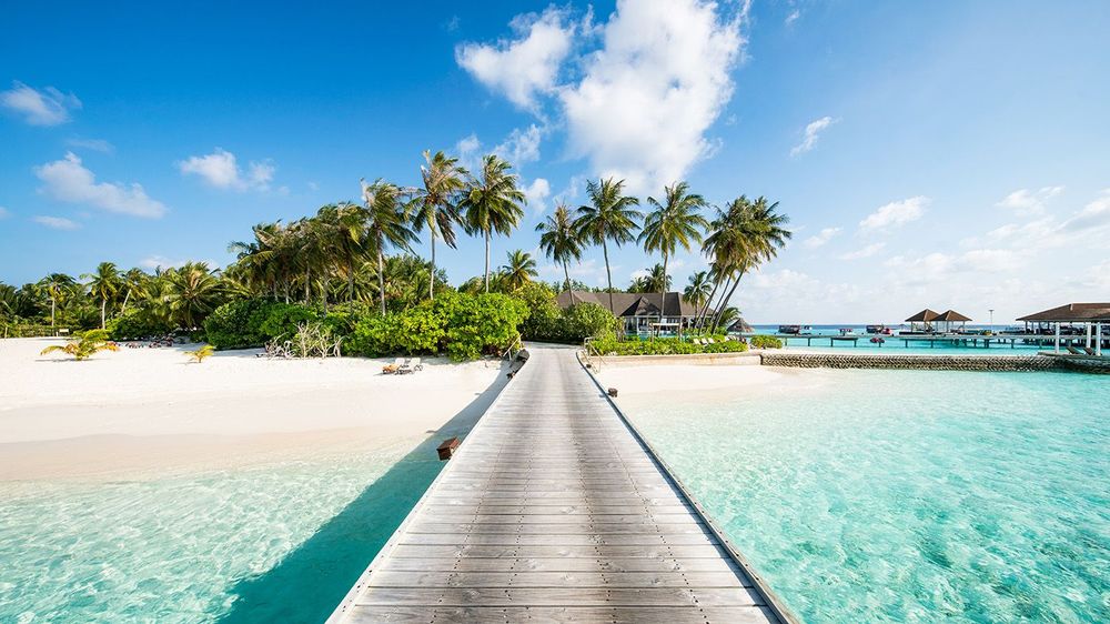 Summer vacation on a tropical island with beautiful beach and pa