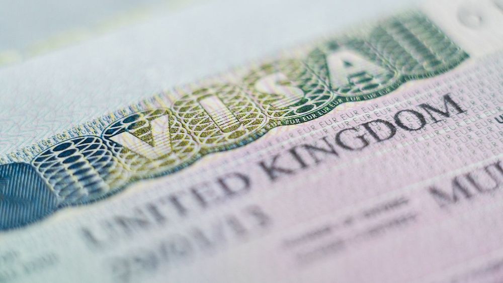 United Kingdom - January 2020: close up of Schengen British visa header in passport