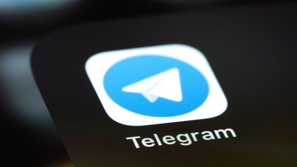 Telegram mobile icon app on screen smartphone iPhone macro. Tele