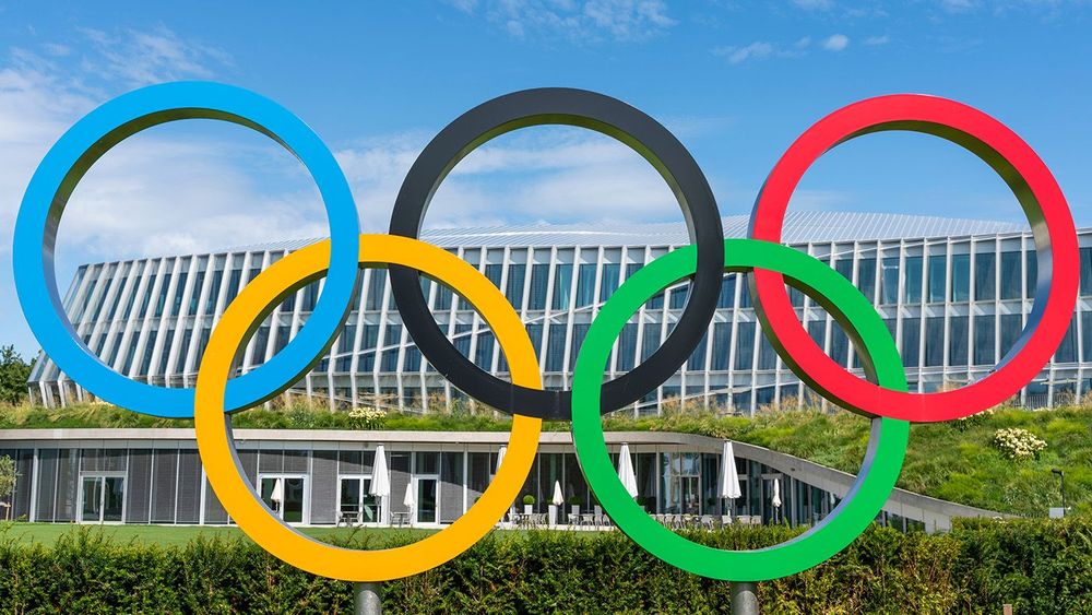 View of the facade with the Olympic rings of the new central bui