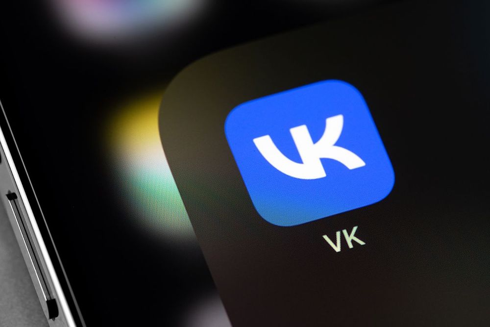 VK (VKontakte) mobile icon app on screen smartphone iPhone. VKon