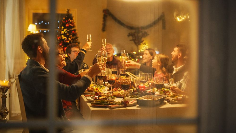 Cinematic Shot Through a Snowy House Window: Christmas Dinner To