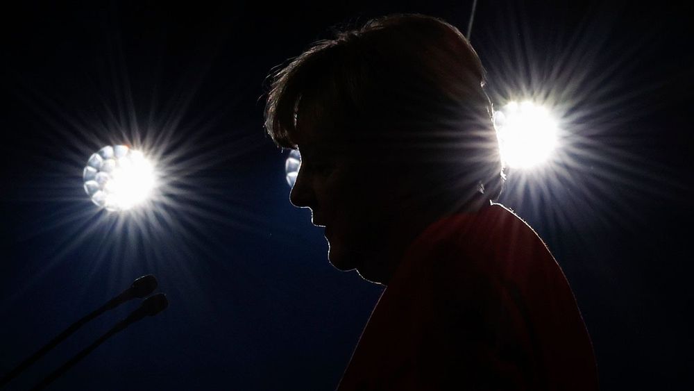 APTOPIX Switzerland Merkel