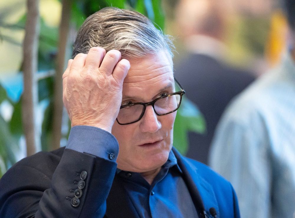 Peter Macdiarmid / Pool Photo via AP