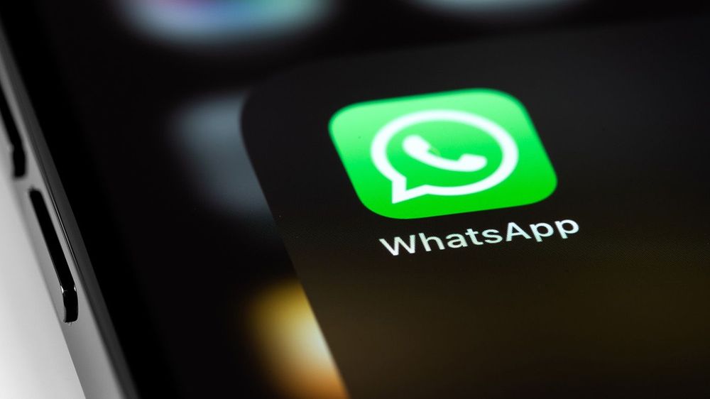 WhatsApp mobile icon app on screen smartphone iPhone macro. What