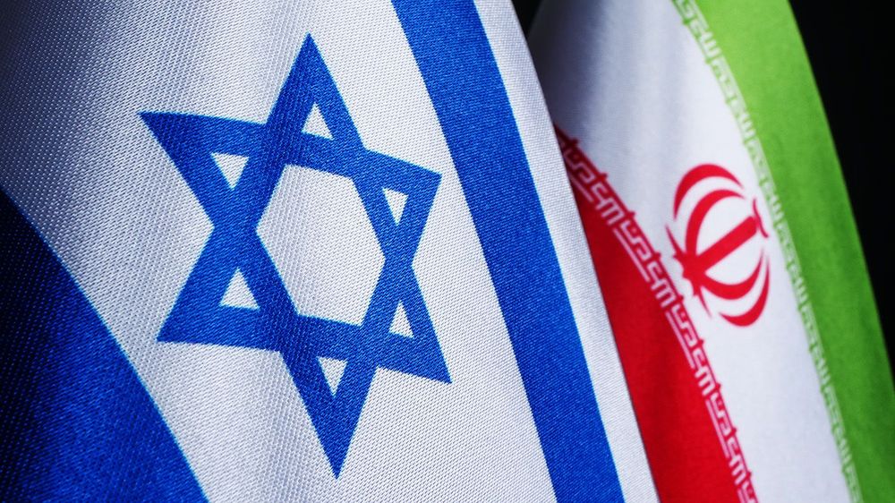 Flags of Israel and Iran, conflict between countries.