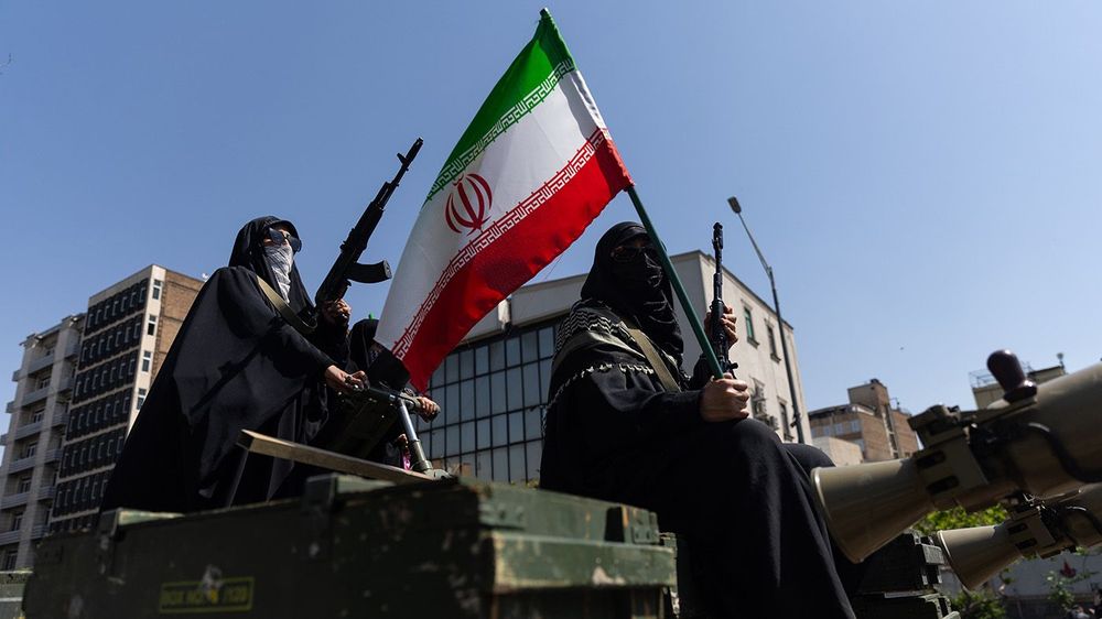 A woman member of the Basij paramilitary, affiliated with