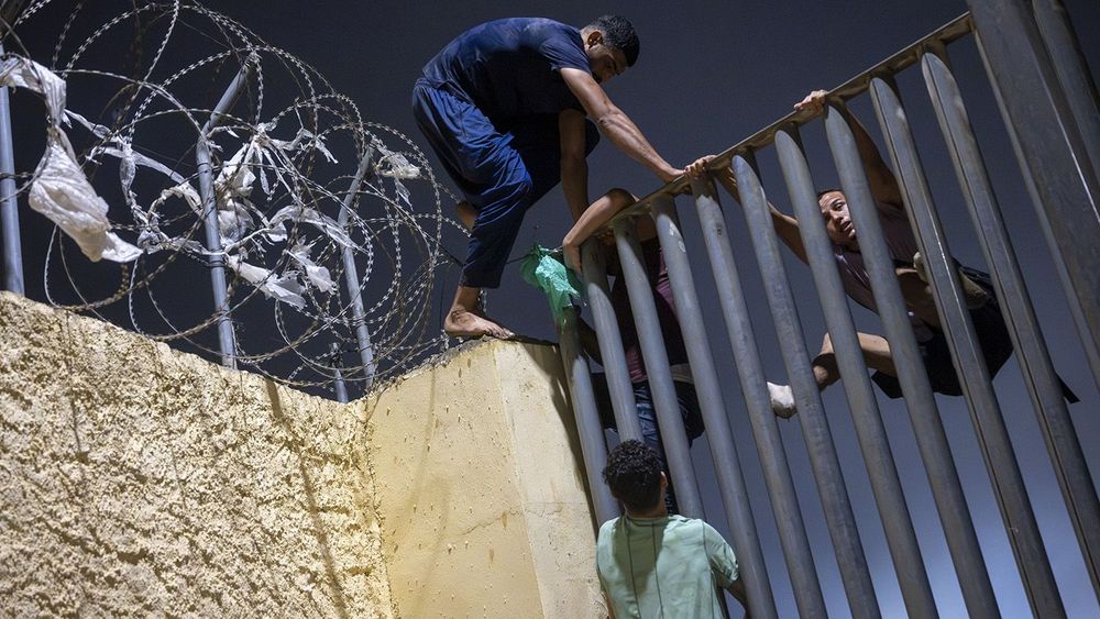 Hundreds of migrants reach Spain's Ceuta after swimming from Morocco