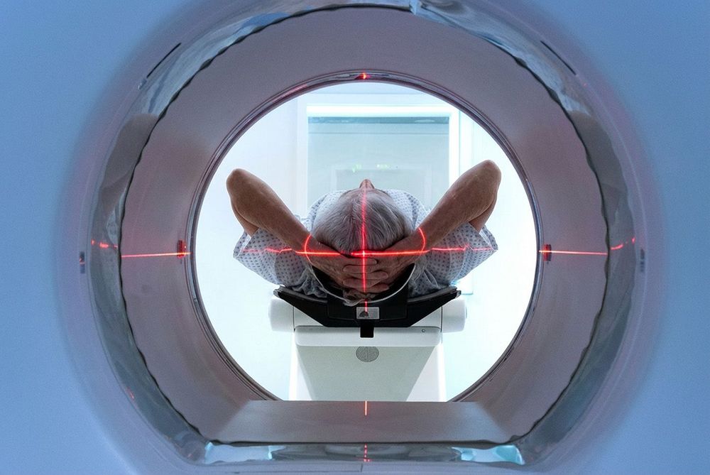 patient entering an MRI machine to produce a detailed and intern