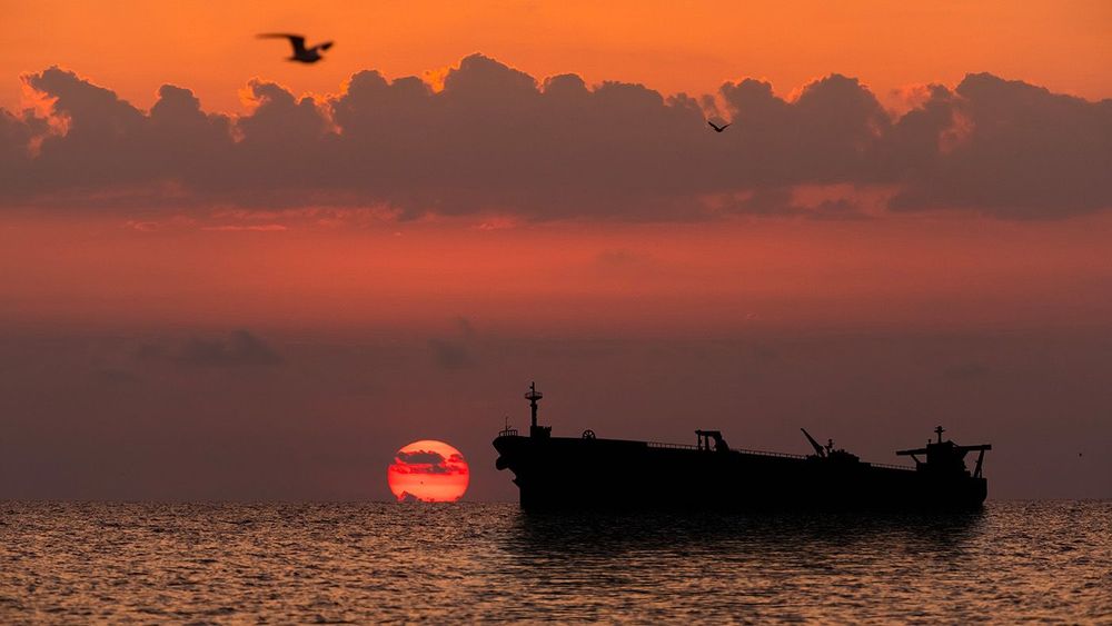 Oil tanker at sea at sunset. World Oil and Gas Industry