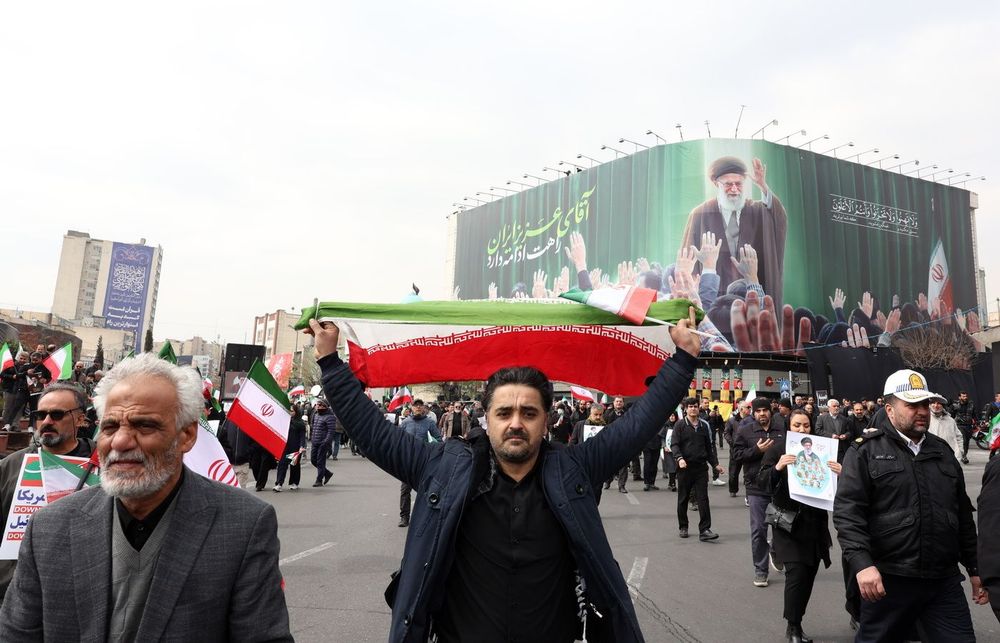 Iran holds mass funeral for military officials killed in conflict